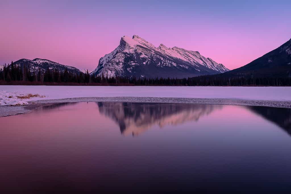 Mt Rundle reflection in Vermillion Lakes at sunset in winter