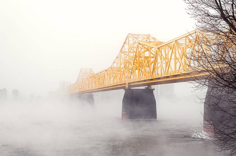 George Rogers Clark Memorial Bridge over River Ohio covered in the fog