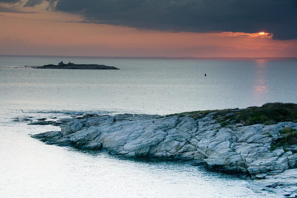 Rocky cliffs of Star Island at sunset