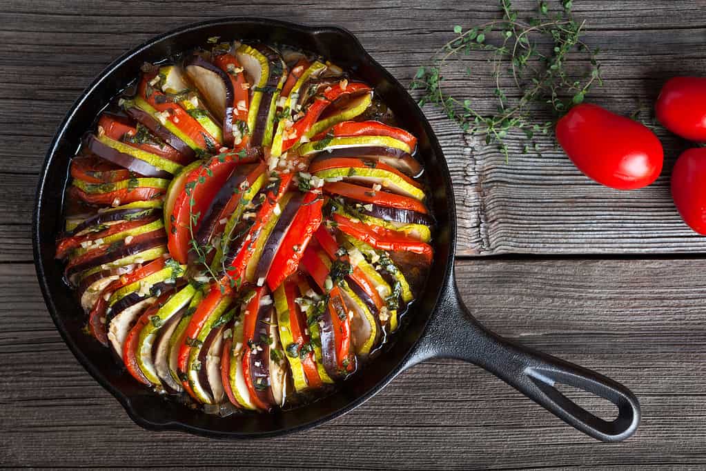Vegetable ratatouille baked in cast iron frying pan traditional homemade