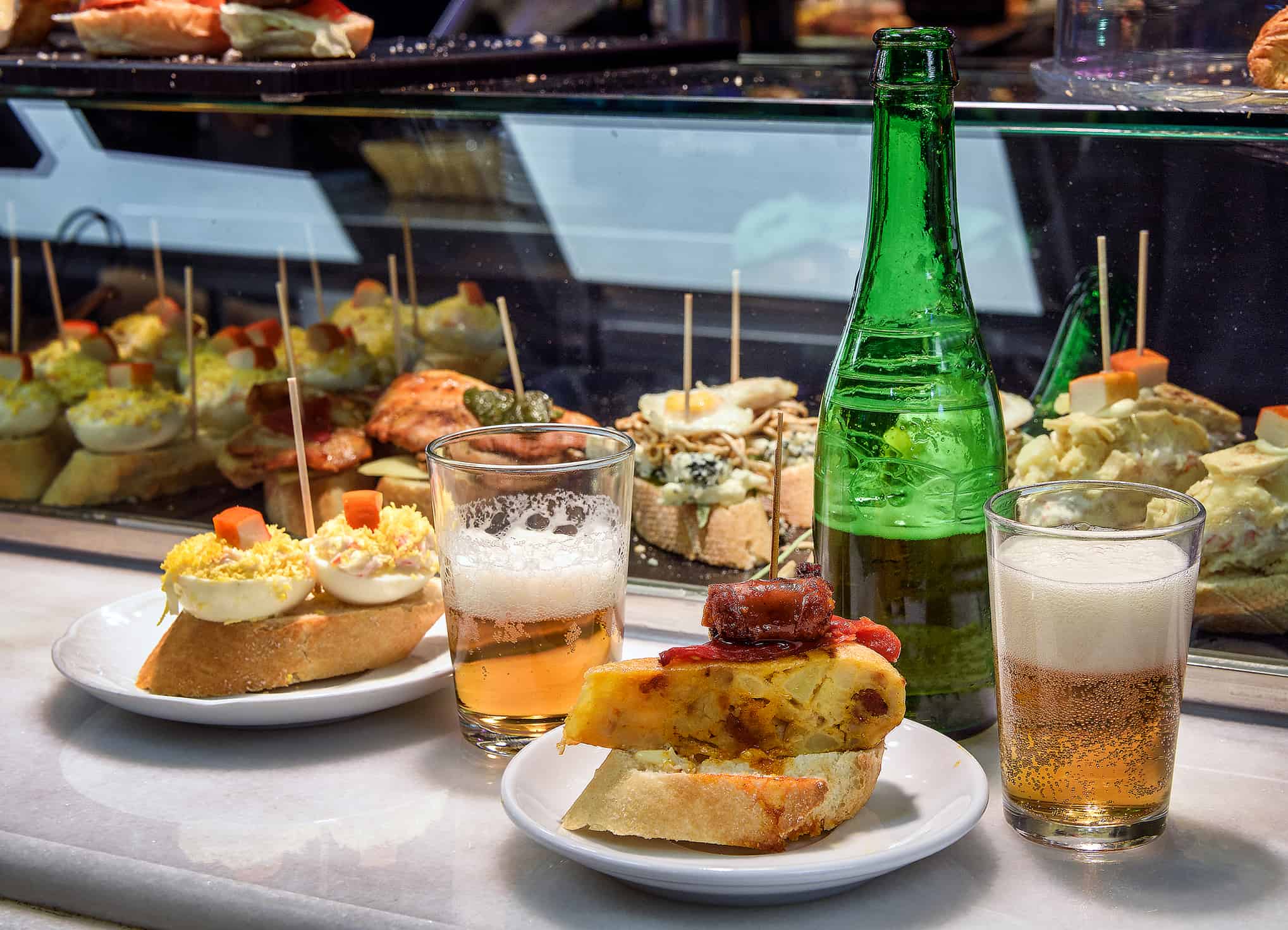 Bar counter with Spanish appetizers "pinchos" and beer