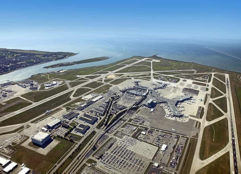 Airport and runways - Vancouver International Airport in Richmond - panoramic aerial view with runways, Fraser River and Pacific Ocean