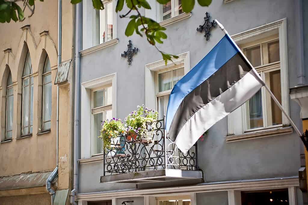 Estonian Flag Flying from a Balcony in Tallinn
