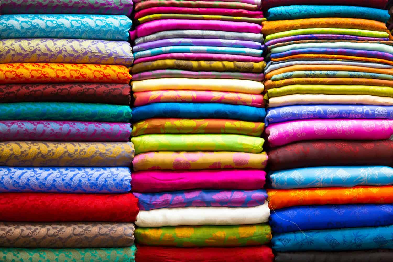 Many colorful material silk on the market. Very popular and traditional souvenir from Vietnam.