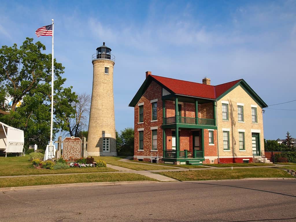 The Kenosha Lighthouse and keeper's house, also sometimes called Southport Light for one of it's former names, on Simmons Island in Kenosha, Wisconsin on a summer day.