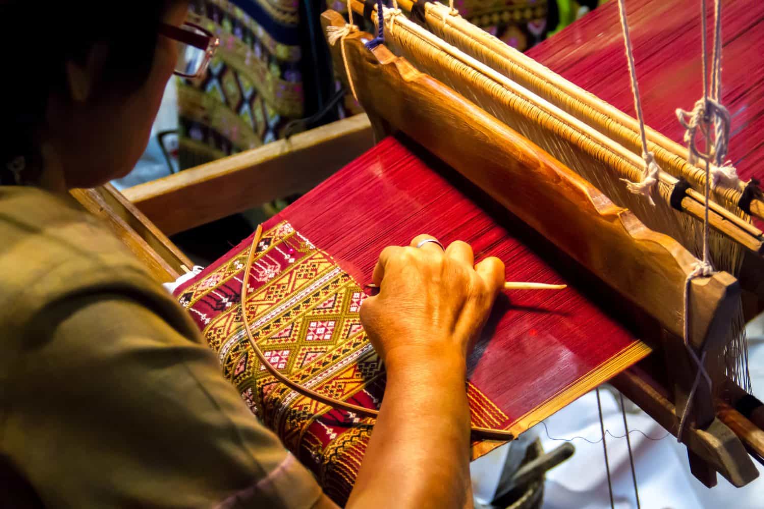 People are silk weaving in Thailand
