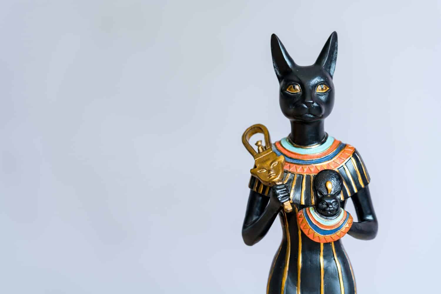 The Goddess Bastet - Role in ancient Egypt on gray background. Bastet was a goddess in ancient Egyptian religion. 