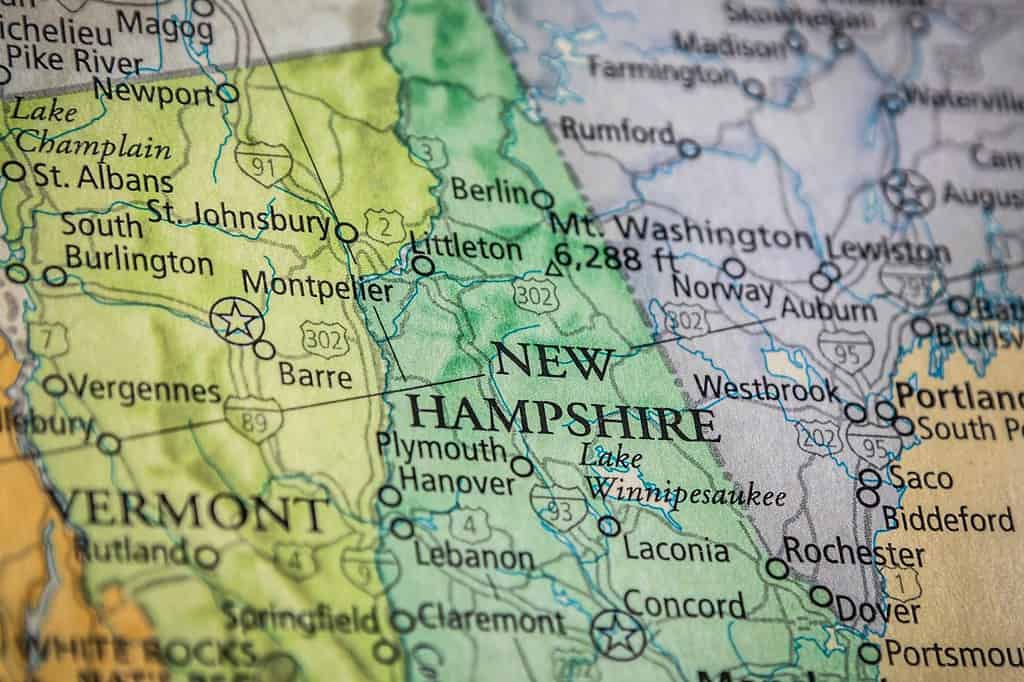 Closeup Selective Focus Of New Hampshire State On A Geographical And Political State Map Of The USA.