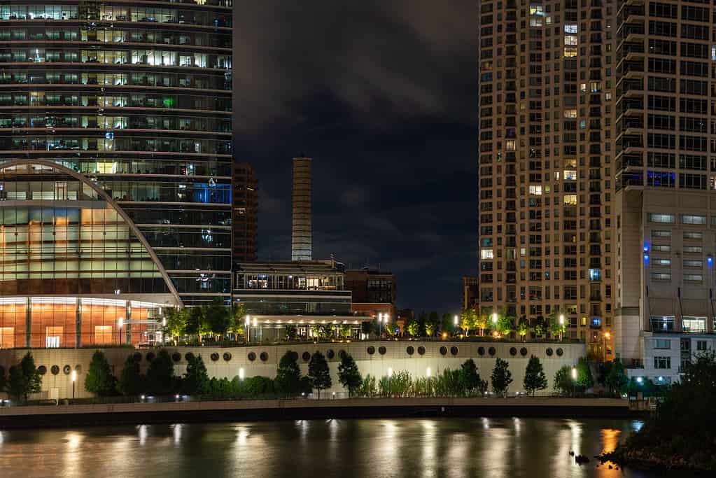 Night scene of the Chicago River and Riverwalk near Wolf Point in West Loop Fulton River District.