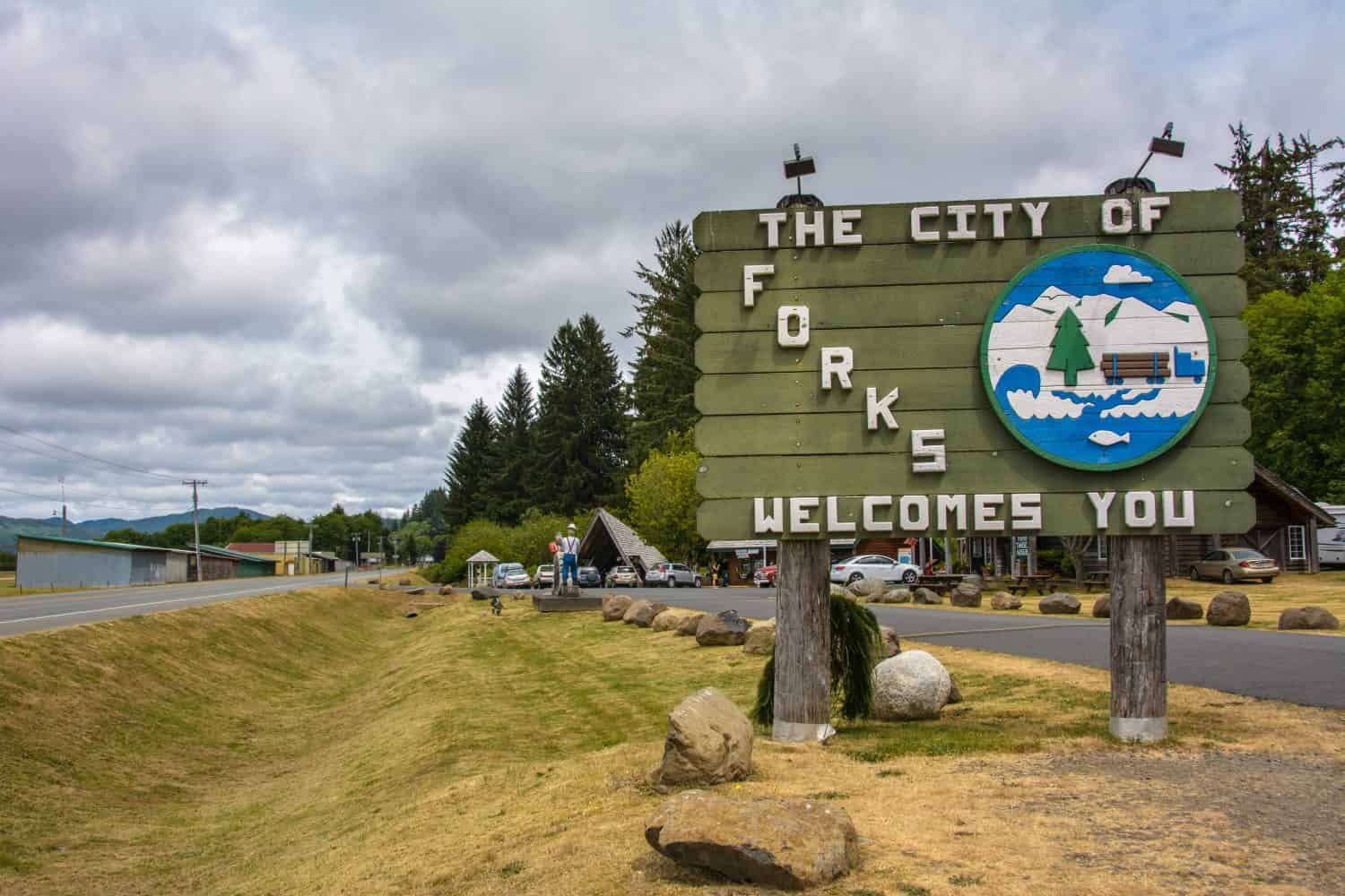 Typical welcome sign at the entrance to an American city. Road sign - Welcome to Forks, Washington
