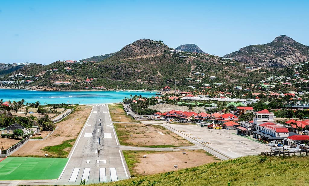 Landscape with village and runway of St Jean on the Caribbean island of Saint Barthélemy ( St Barts ).