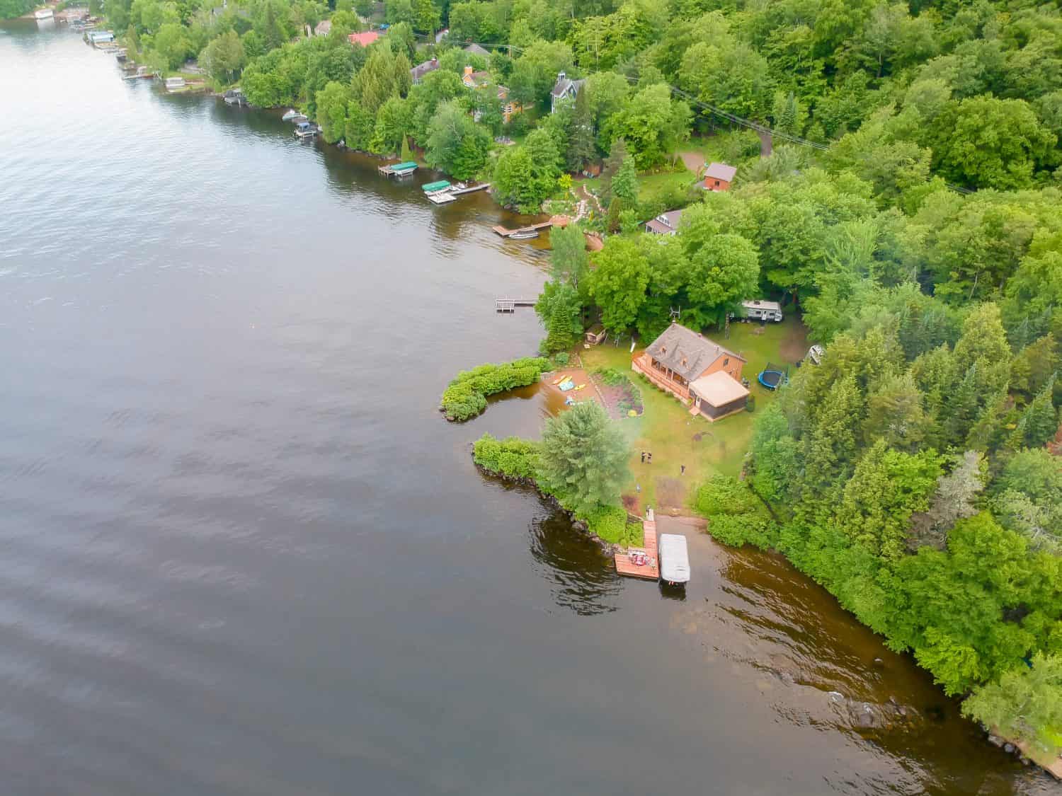Aerial view of a coast house in the Saint-Joseph Lake, Quebec, Canada