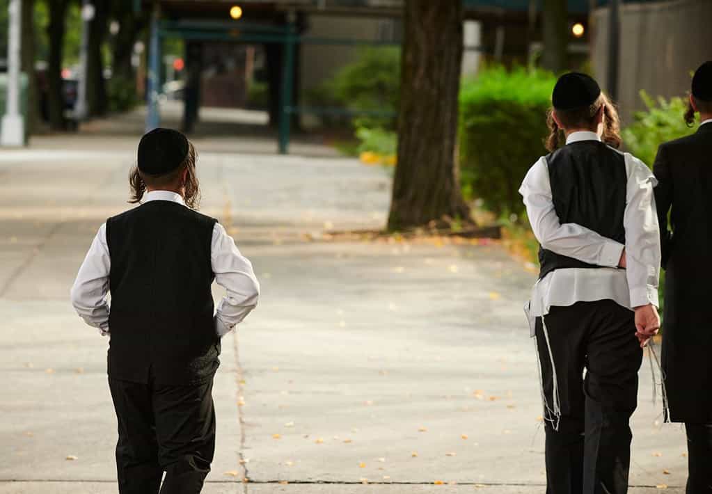 Hasidic Jews walk to temple on the sabbath in Williamsburg Brooklyn