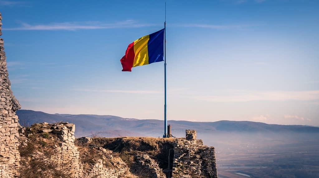 Large Romanian flag on windy day