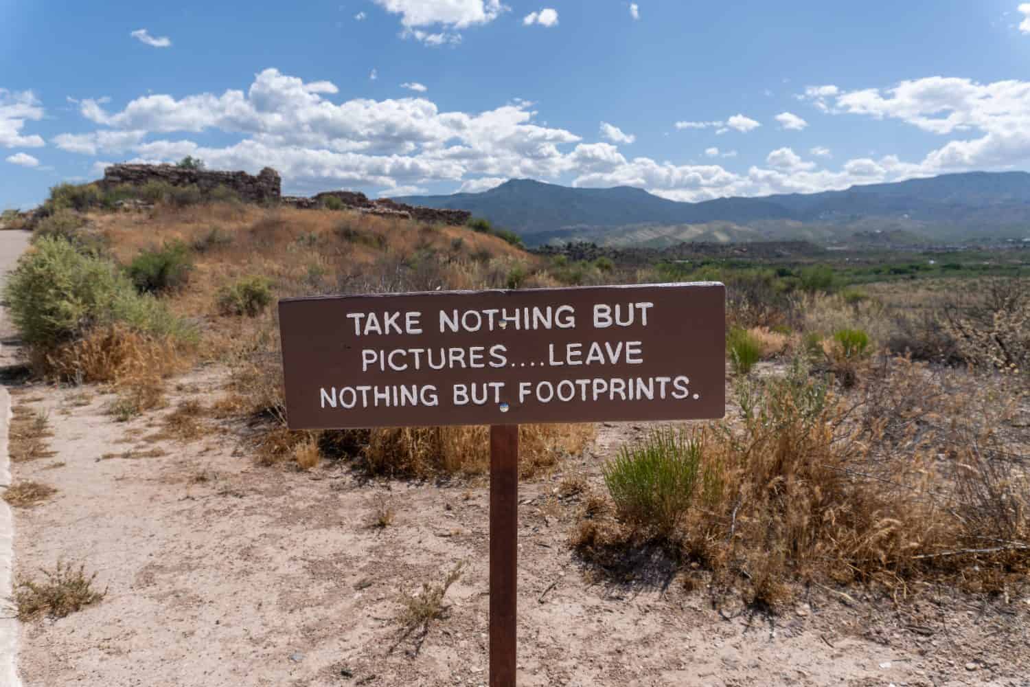 Take nothing but pictures... leave nothing but footprints. Sign at Tuzigoot National Monument reminds visitors of Leave No Trace ideology. 