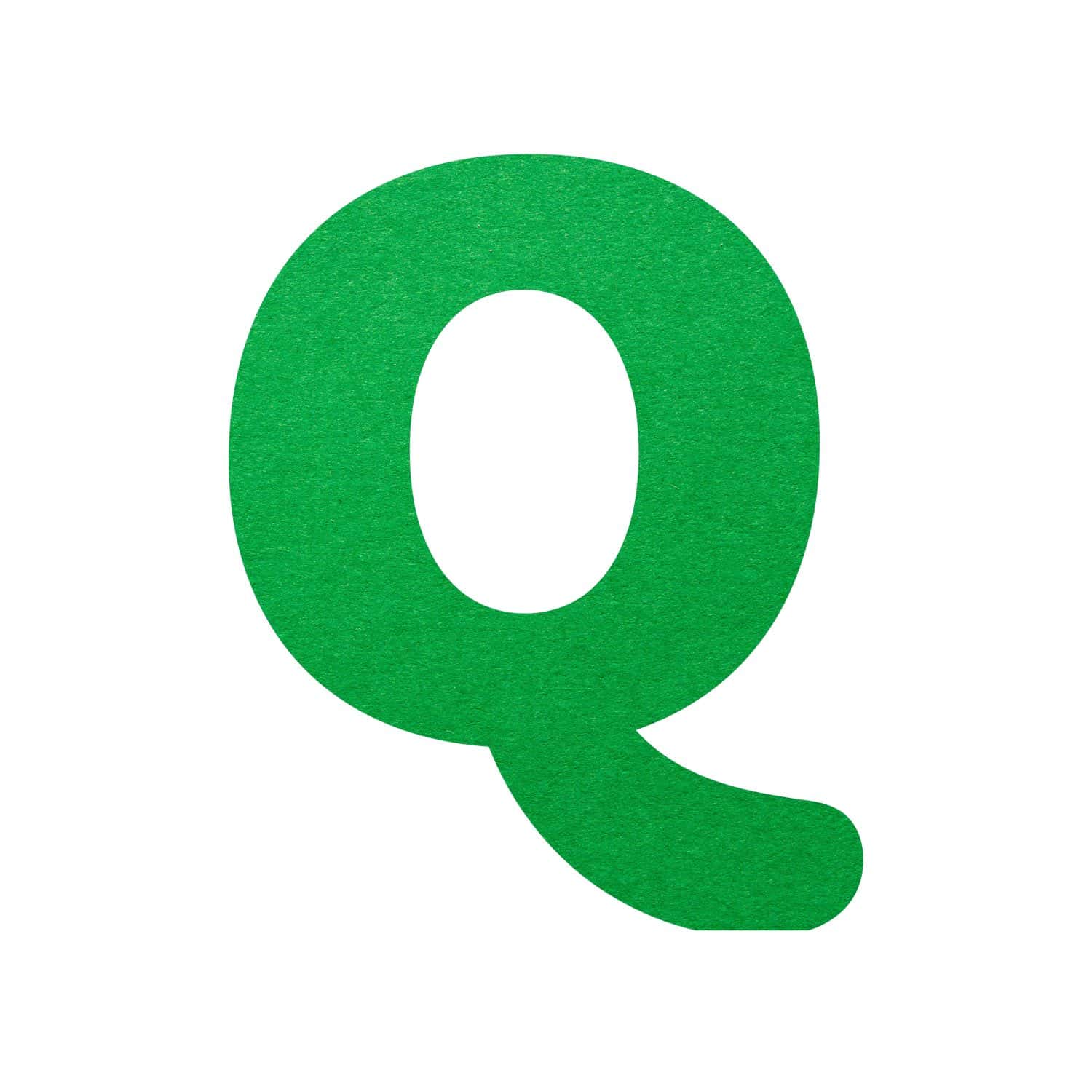 Green paper letter Q isolated on white background. Alphabet series.