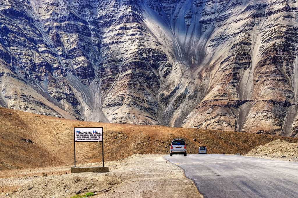A gravity hill where slow speed cars are drawn against gravity is famously known as "Magnetic Hill" , a natural wonder at Leh, Ladakh, Jammu and Kashmir, India