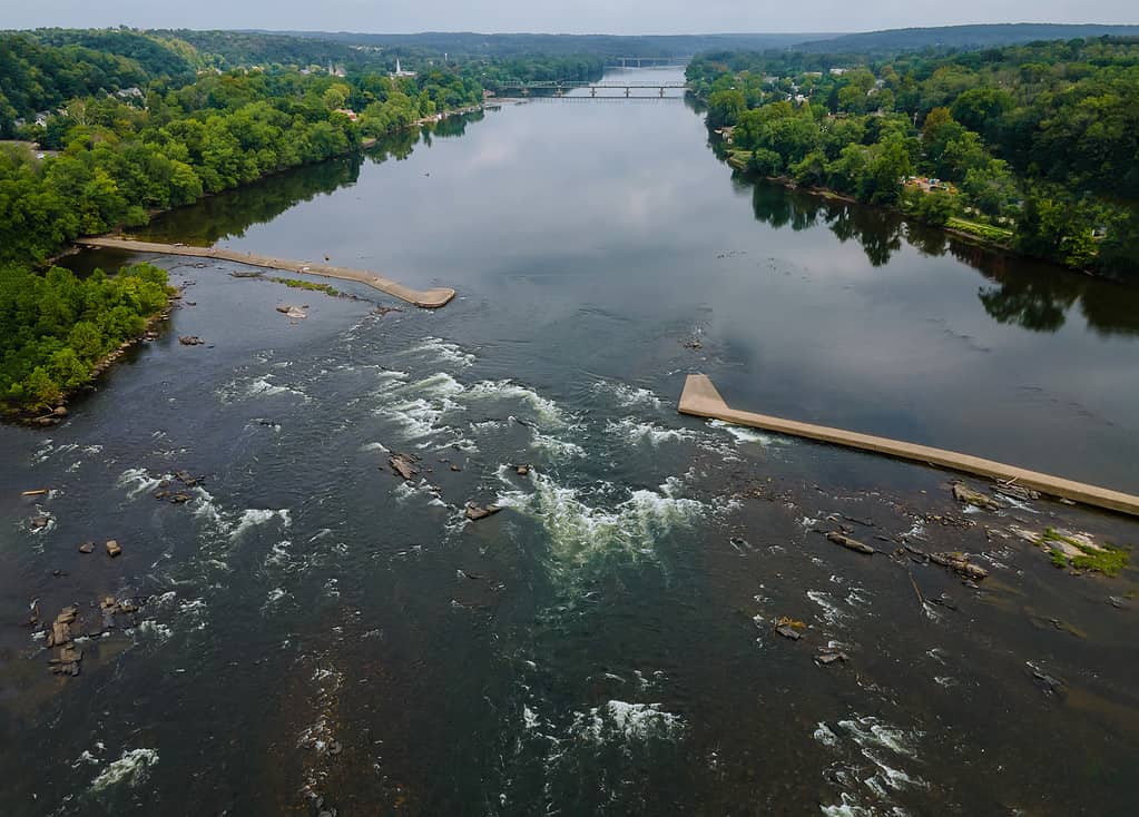 Aerial view of forests and the mountain river in crystal clear water flows with Delaware river Pennsylvania USA