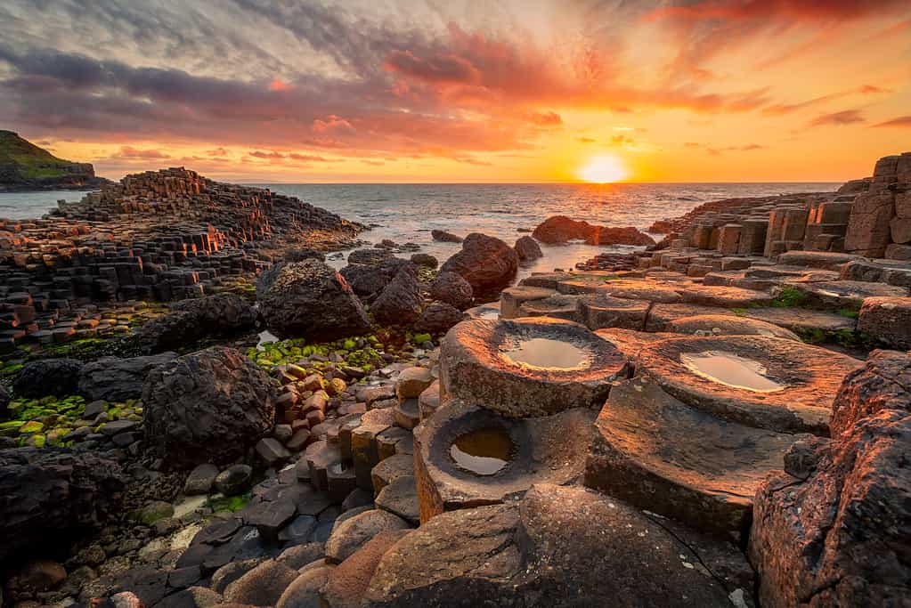 sunset over basalt columns Giant's Causeway, County Antrim, Northern Ireland