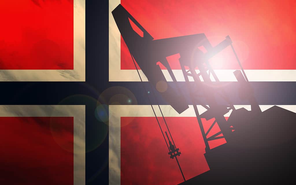 Oil pump on Norway flag background