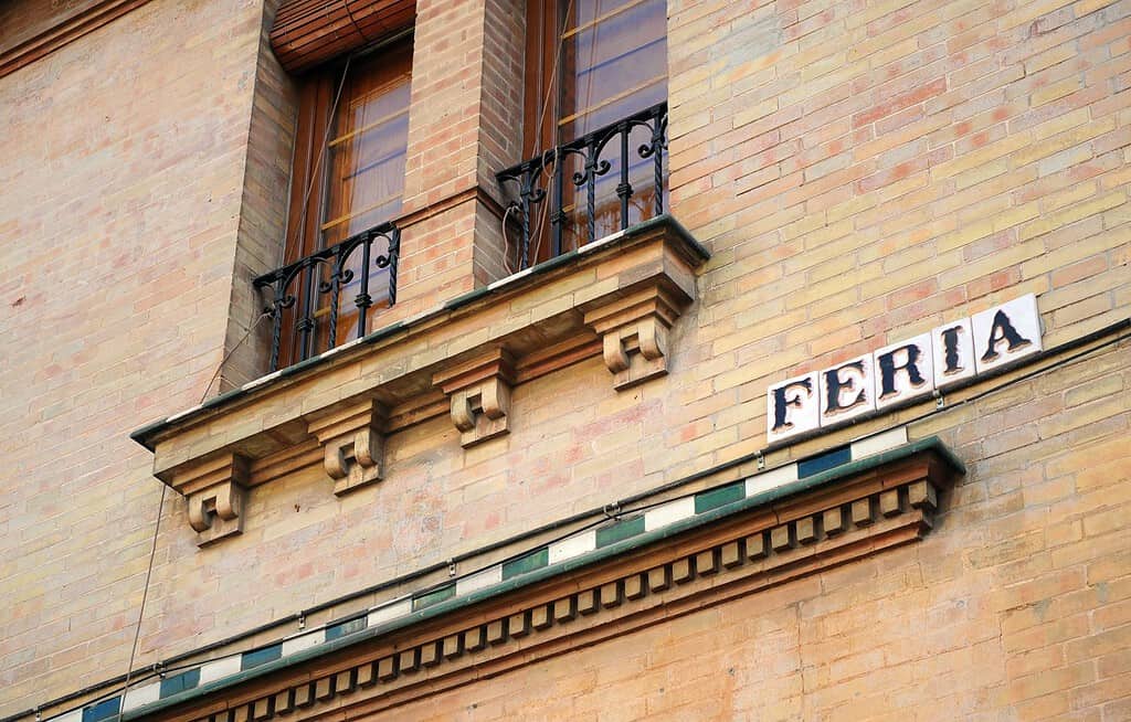 Tiles sign of Feria street located in downtown of Seville where a famous and historic flea market ("el jueves") is held every Thursday