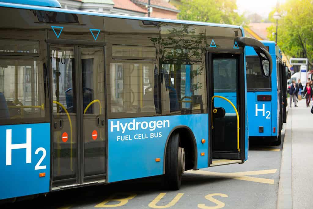 A hydrogen fuel cell buses stands at the bus station