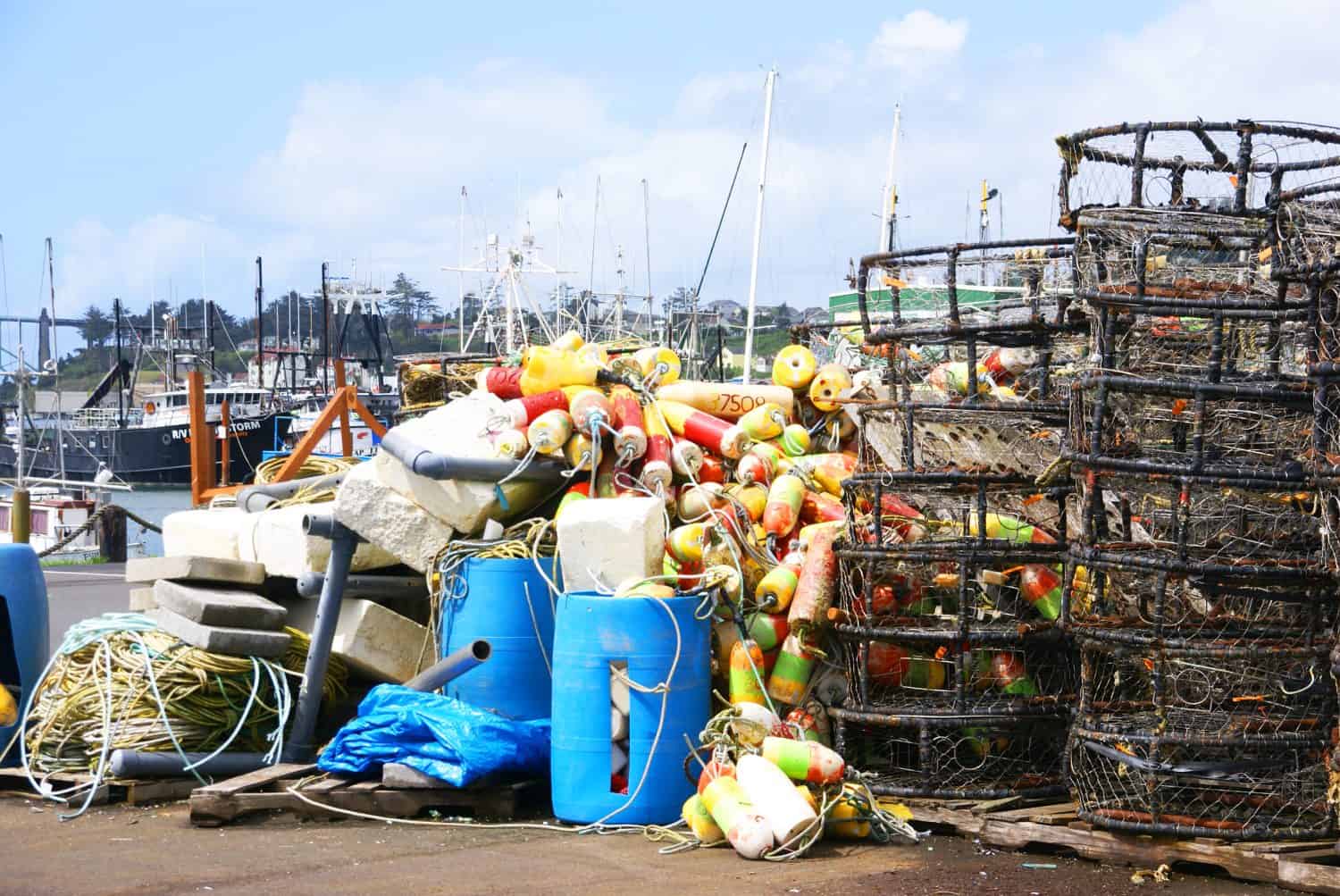 Crab traps, pots and floats, stacked on wharf,  Newport, Oregon Coast