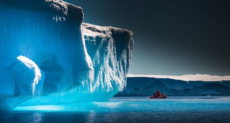 Scientists Explore Antarctic Icebergs by Boat