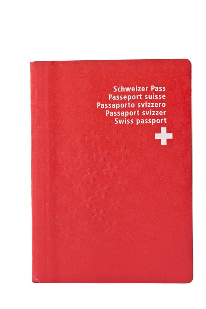Frequently used Swiss passport, isolated on white.