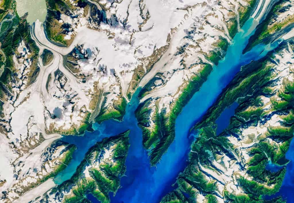 The Specter of a MegaTsunami in Alaska. Landsat images helped convince researchers that a slumping mountainside overlooking Barry Arm fjord. Elements of this image furnished by NASA.