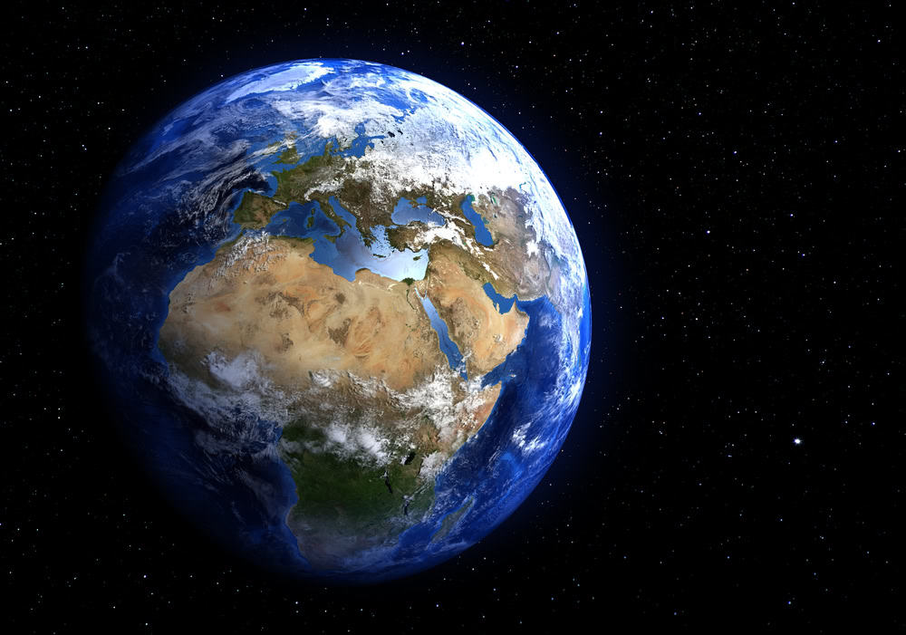 The Earth in space showing Europe and Africa. Extremely detailed image, including elements furnished by NASA. Stars in the background.
