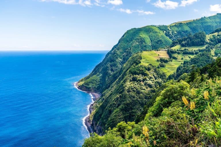 A view south of coastal scenery from the viewpoint at Sossego on the island of Sao Miguel in the Azores in summertime