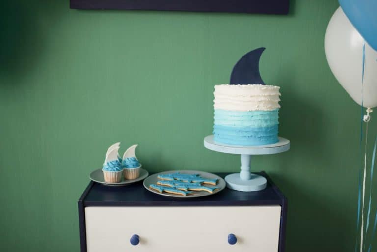 Delicious cake decorated with shark fin, baking for children's party