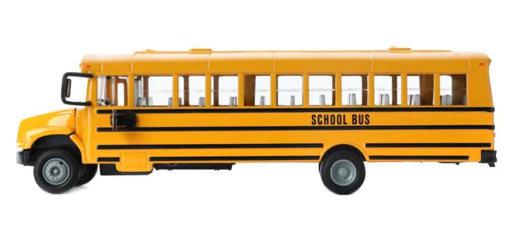 Yellow school bus isolated on white. Transport for students
