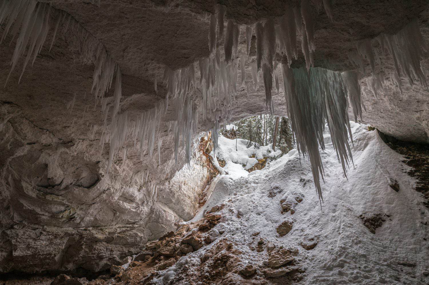 Ice stalactites in a karst cave. Arkhangelsk region, Russia