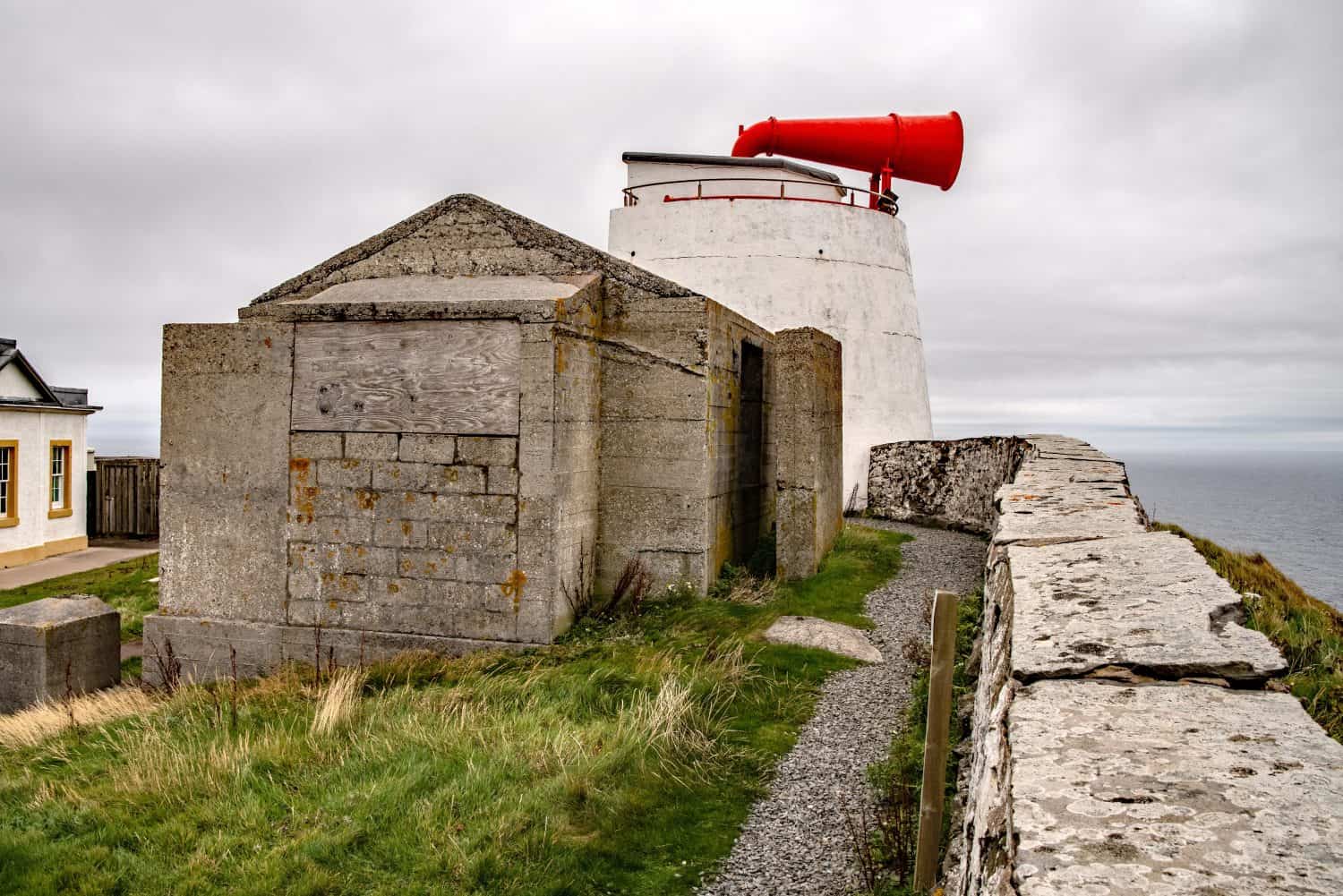 Landscape view of the east radar hut and foghorn at Sumburgh Head, Shetland, Scotland.