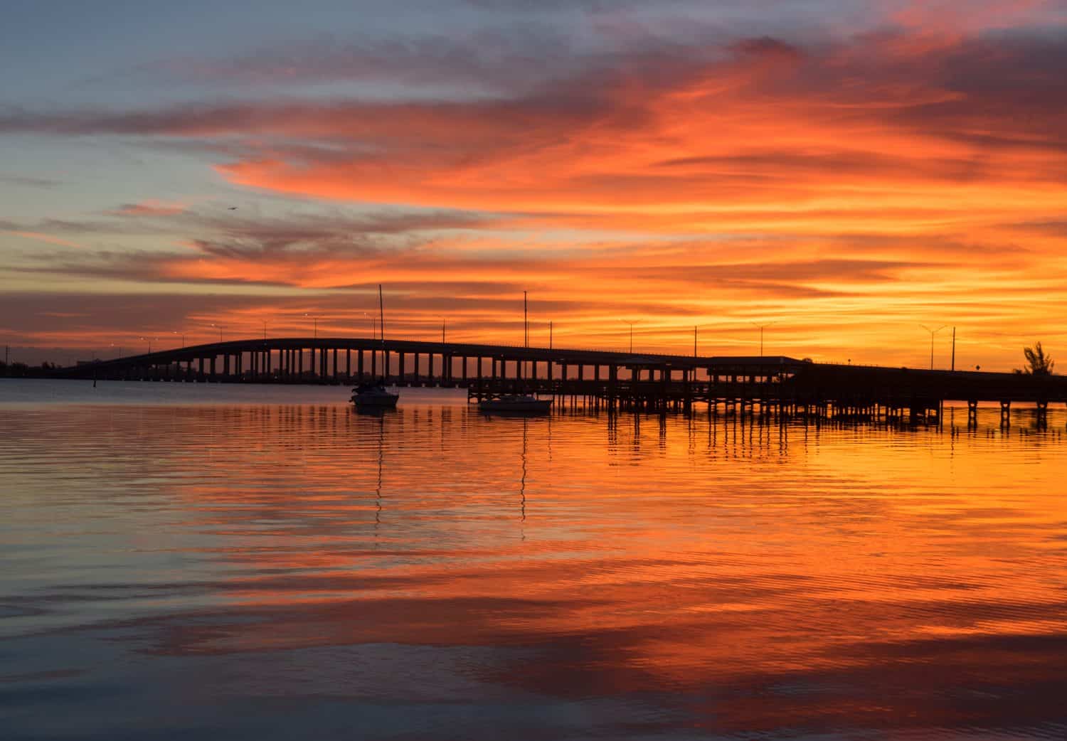 The Sunrise over the Eau Gallie Causeway Bridge