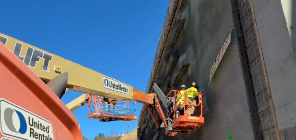 NCDOT working on the construction of the bat wall along I-40.