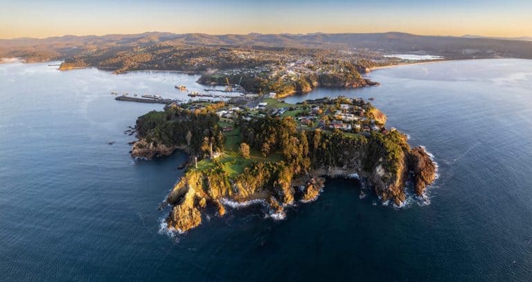 Dawn aerial panorama of the coastal town of Eden, NSW Australia