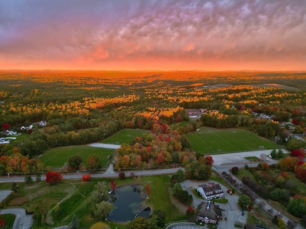 Early morning sunrise resulting in pink textured clouds during fall in southern New Hampshire