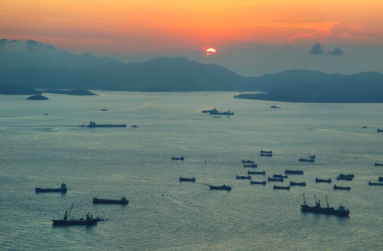 View of sunset over South China sea from 100 floor of ICC building in Hong Kong.