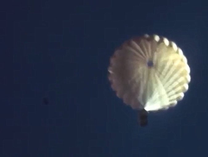 Beaver drop box parachuting to land Idaho 1950
