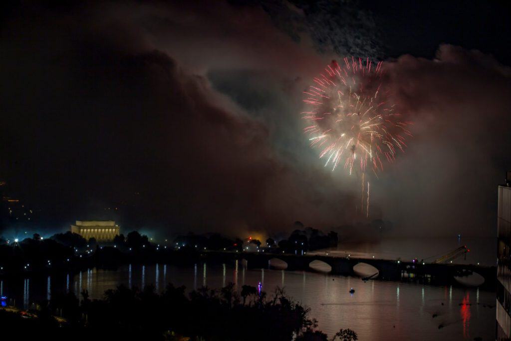 Foreboding smoke cloud looms with Independence Day fireworks over the National Mall in Washington DC
