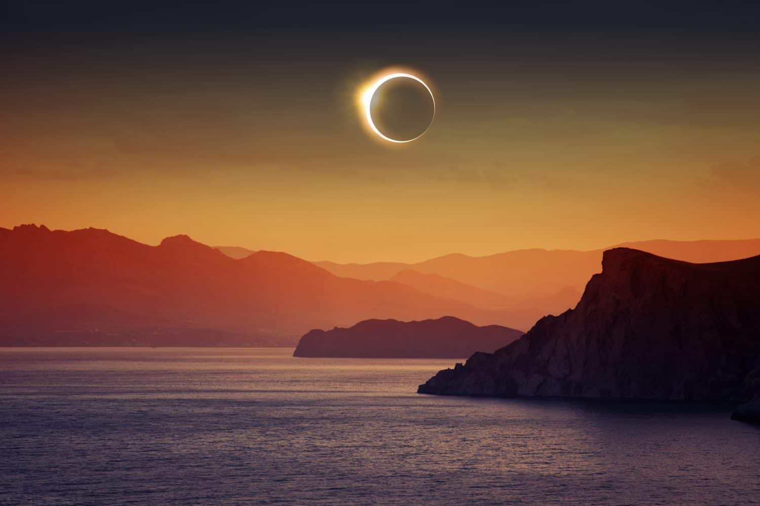 Scientific background, astronomical phenomenon - full total solar eclipse, mountains and sea