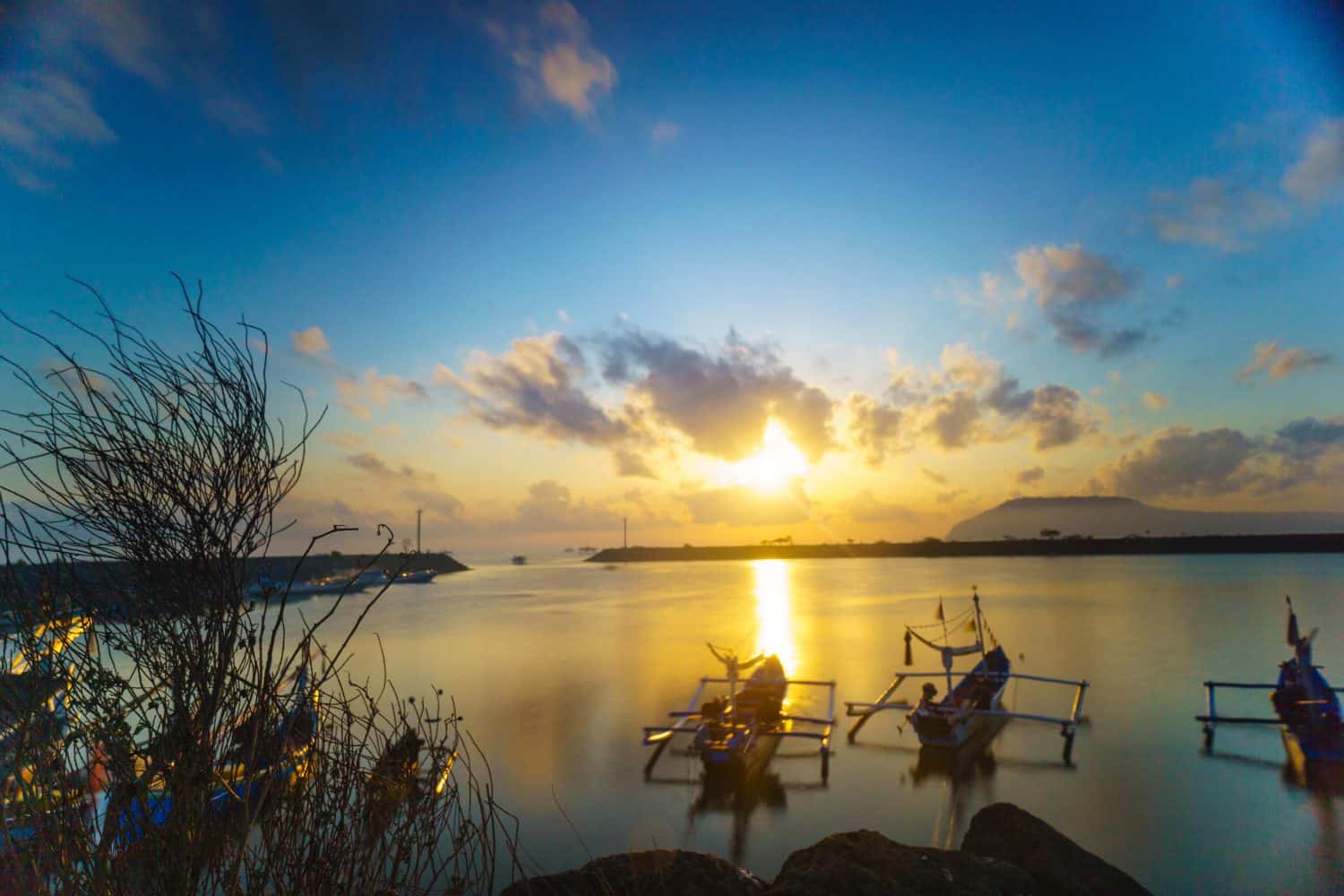 Shaky boats in long exposure photography : sunrise in fishermen port Muncar, Banyuwangi