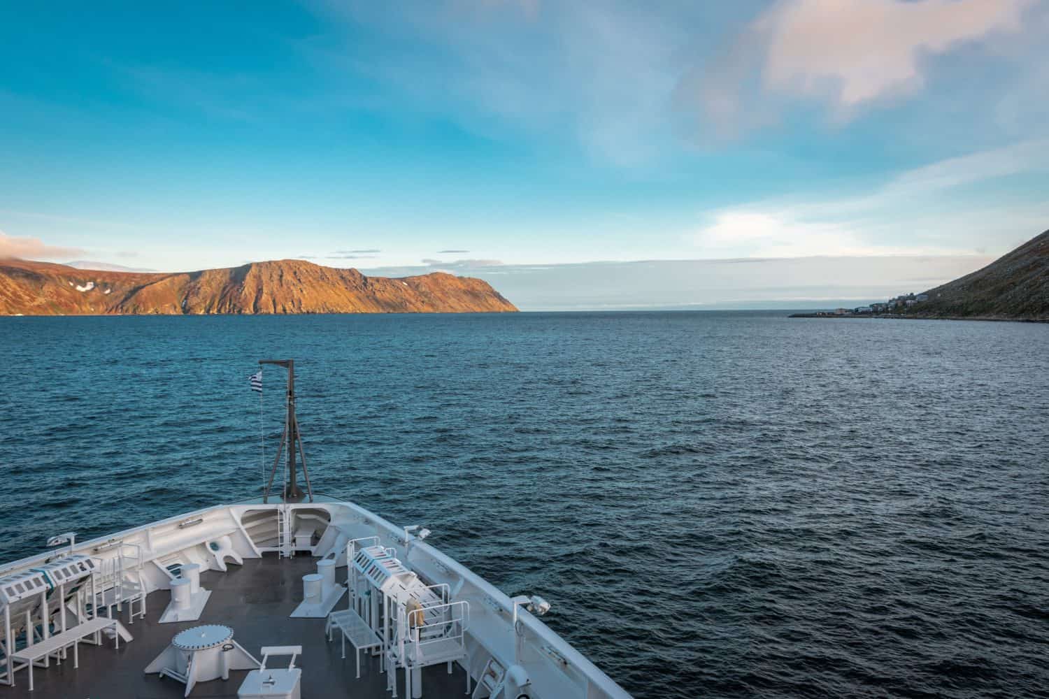Expedition ship near Big Diomede Island witch other name is Ratmanov Island , Russian Chukotka district on the left and Little  Diomede Island  on the right,Alaska region USA, Bering strait