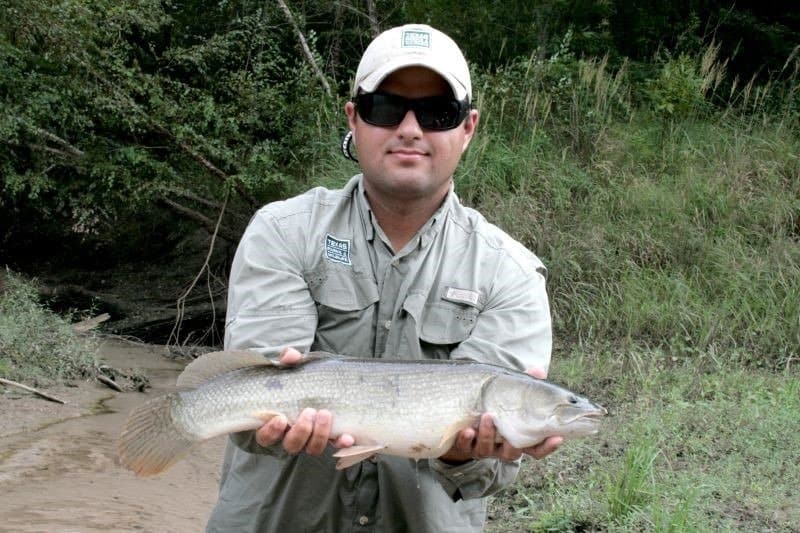 Fisherman with Bowfin